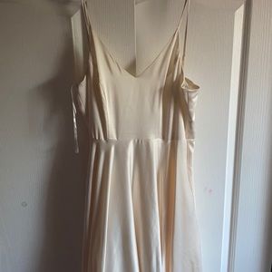 Floor length egg shell colored evening gown